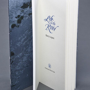 The book open to display the endsheet and title page