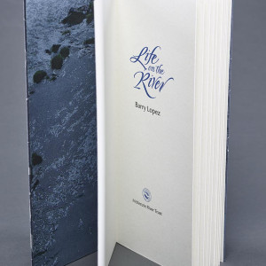 The book open to display the endsheet and title page